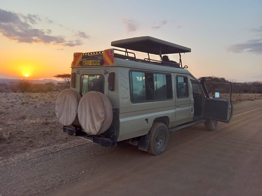 Fleet of Leopard Orchid safari vehicles ready to depart