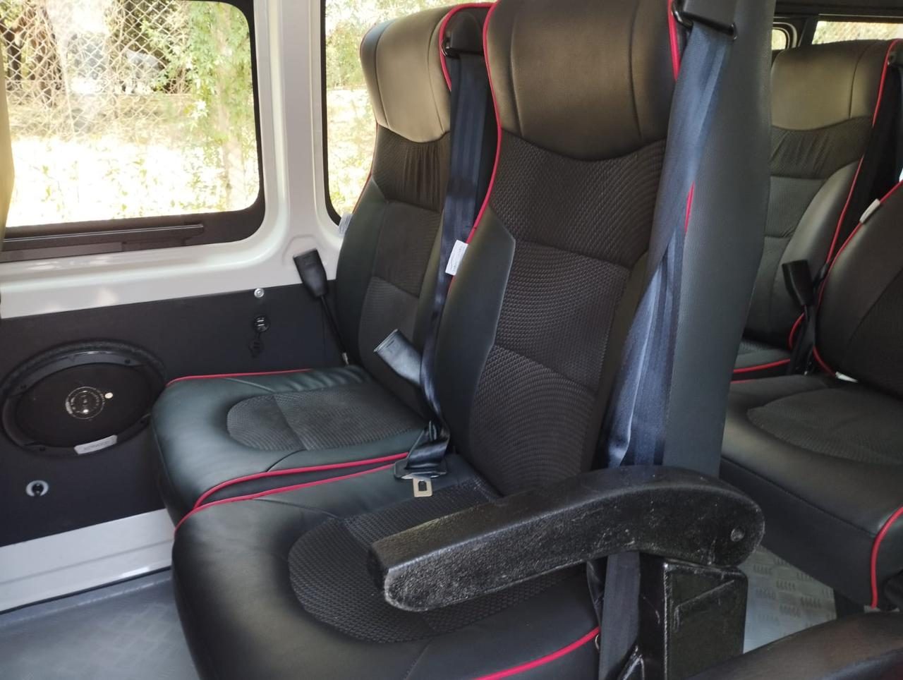Leather trimmed reclining seats inside the tourist van