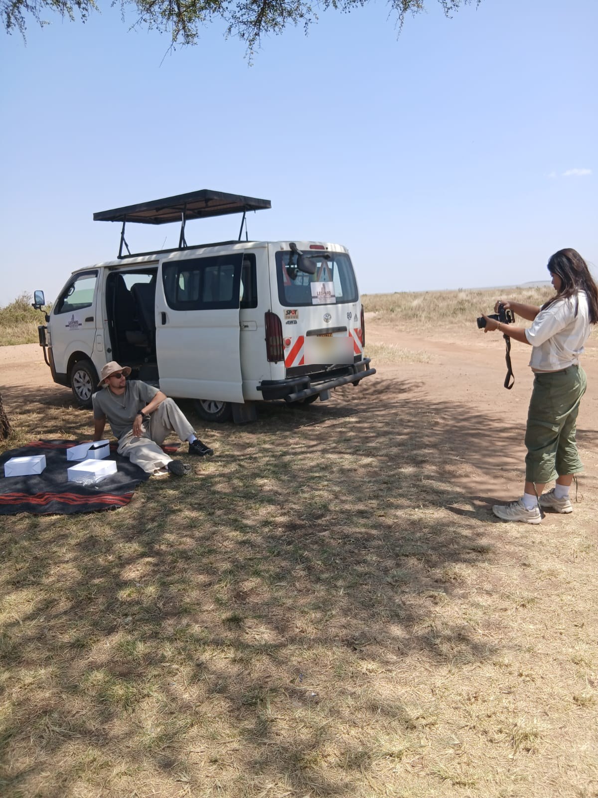 Bush picnic set beside our safari van in the Masai Mara